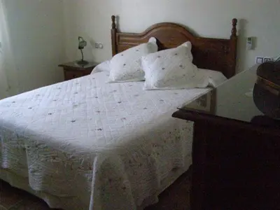 Cama o camas de una habitación en Casa Rural el Pinar en Posadas Córdoba