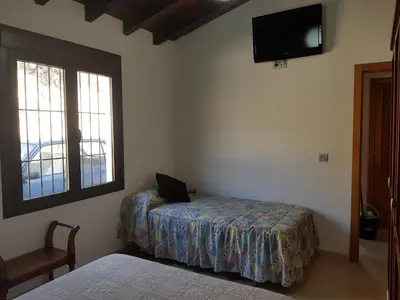 Cama o camas de una habitación en Casita la Herilla