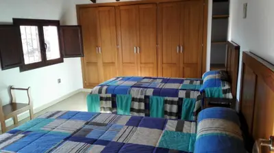 Cama o camas de una habitación en Casita la Herilla