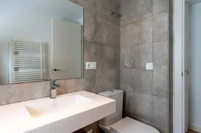 Un baño de Bustos Tavera Olehousing