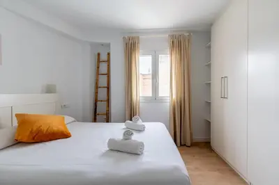 Cama o camas de una habitación en Bustos Tavera Olehousing