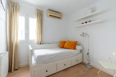 Cama o camas de una habitación en Bustos Tavera Olehousing