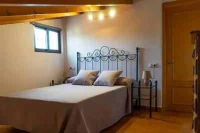 Cama o camas de una habitación en Casa Rural Mis Niñas