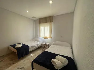 Cama o camas de una habitación en Apartamento Palmones