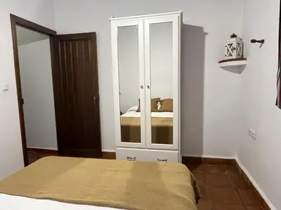 Cama o camas de una habitación en Casa de campo Fuencaliente, entorno natural, chimenea, piscina