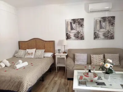 Cama o camas de una habitación en Casa Rural Rocío -Caminito del Rey