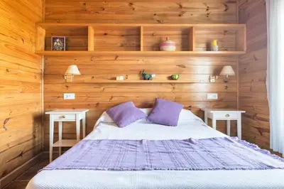 Cama o camas de una habitación en Casa de Madera del Turullote