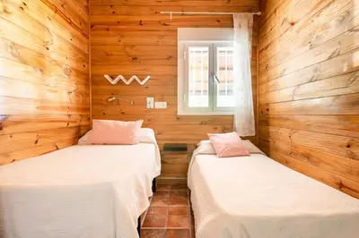 Cama o camas de una habitación en Casa de Madera del Turullote