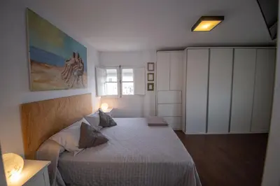 Cama o camas de una habitación en Apartment Seville Mirador Puerta Carmona