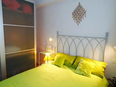 Cama o camas de una habitación en Apartamento Córdoba con encanto LUBI II