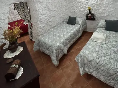 Cama o camas de una habitación en Casa/Cueva el Cigarrillo