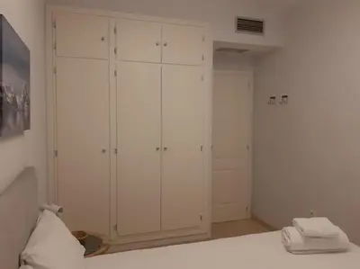 Cama o camas de una habitación en NUEVO-LUMINOSO Y MODERNO. Parking gratis!!
