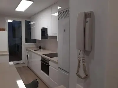 Una cocina o zona de cocina en NUEVO-LUMINOSO Y MODERNO. Parking gratis!!