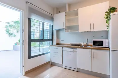 Una cocina o zona de cocina en Céntrico y acogedor apartamento
