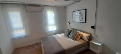 Cama o camas de una habitación en Sunny handmade home. WI-FI, a/c & free parking