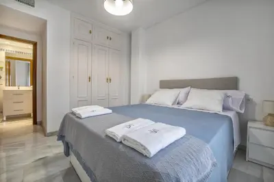 Cama o camas de una habitación en Apto Flor del Olivo- Parking