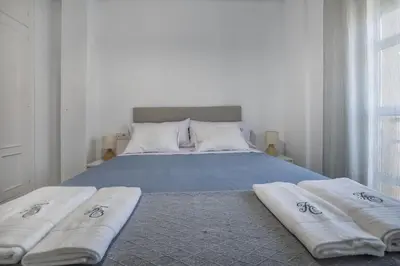 Cama o camas de una habitación en Apto Flor del Olivo- Parking