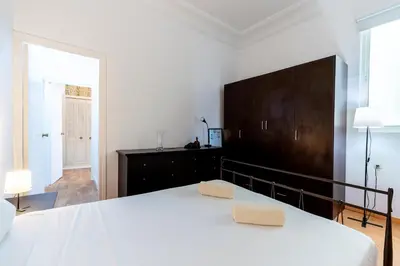 Cama o camas de una habitación en AoA Conde de Ibarra Apartment