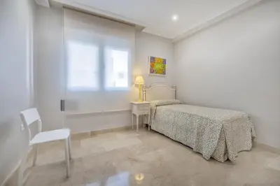 Cama o camas de una habitación en Apartamento Los Tilos & Parking & Piscina