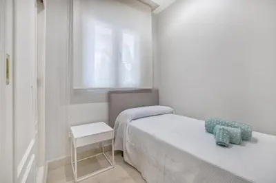 Cama o camas de una habitación en Apartamento Los Tilos & Parking & Piscina