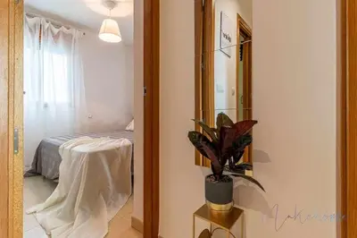 Cama o camas de una habitación en Apartamento 4 en Estadio Sevilla 8 plazas y metro