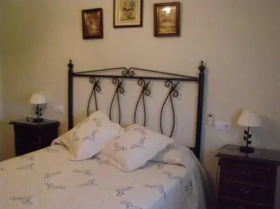Cama o camas de una habitación en Casa Rural Alameda en Posadas Córdoba