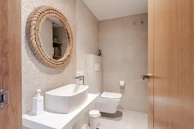 Un baño de Casa FIBES - Congresos parking y alberca