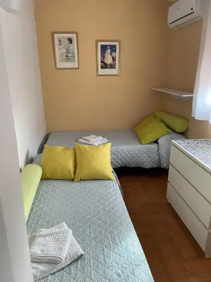 Cama o camas de una habitación en Familia anfitriona acoge