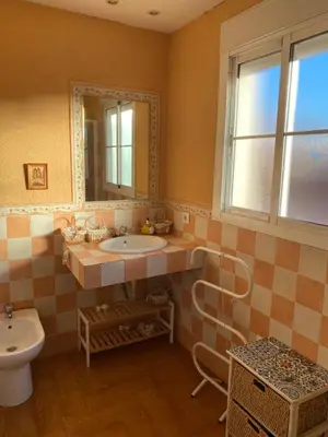 Un baño de Familia Anfitriona acoge terraza