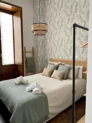 Cama o camas de una habitación en WISH SUITE LA FLORIDA DE SEVILLA