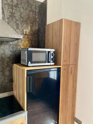 Una cocina o zona de cocina en WISH SUITE LA FLORIDA DE SEVILLA