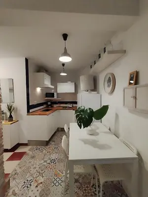 Una cocina o zona de cocina en LA CASA DEL VIENTO ATQ