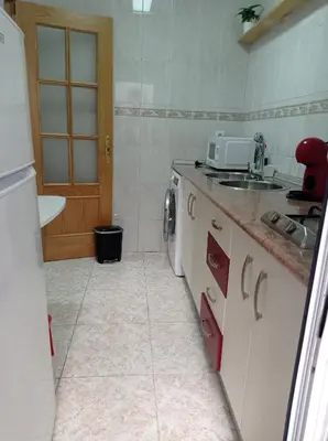 Una cocina o zona de cocina en Apartamento La Reina Home
