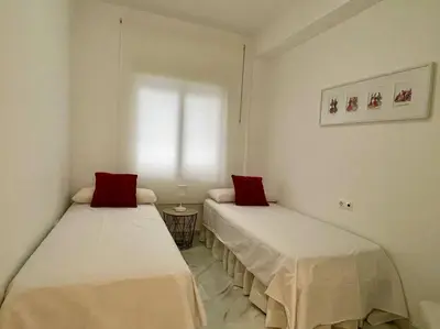 Cama o camas de una habitación en Geysotur La Victoria