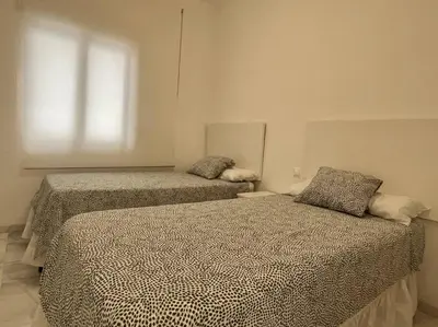 Cama o camas de una habitación en Geysotur La Victoria