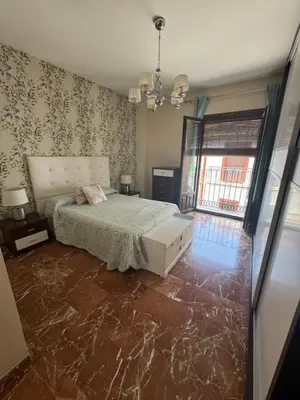 Cama o camas de una habitación en EL NIDO
