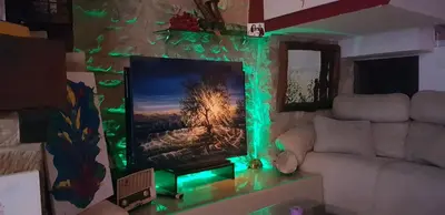 Una televisión o centro de entretenimiento en La Casa del Pintor - Estudio de Arte en Baeza