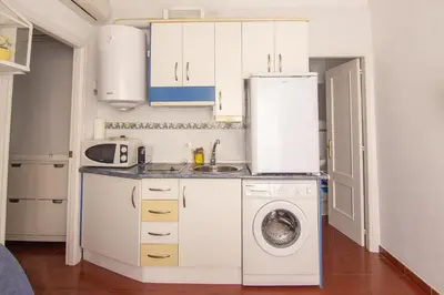 Una cocina o zona de cocina en RentalSevilla Joaquín Costa