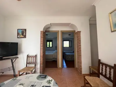 Una televisión o centro de entretenimiento en Alojamiento rural Huerta Mandre