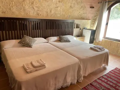Cama o camas de una habitación en Viña Zarzarrosa Osuna