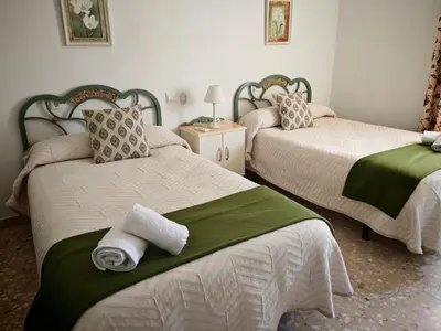 Cama o camas de una habitación en Alojamiento Rural Casa la Abuela