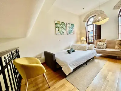 Cama o camas de una habitación en Charming 2 Bedroom Apartment at Sevilla City Center By OCityzen