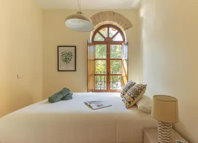 Cama o camas de una habitación en Charming 2 Bedroom Apartment at Sevilla City Center By OCityzen
