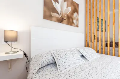 Cama o camas de una habitación en CASA ANGELITA Caminito del Rey, Apartamento con cocina en el centro de Andalucía