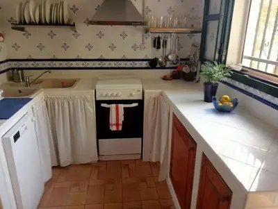 Una cocina o zona de cocina en FINCA EL ROMERO, Finca a 15 minutos de Sevilla