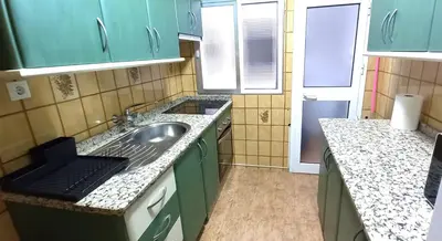 Una cocina o zona de cocina en Céntrico apartamento en Córdoba by beBalmy