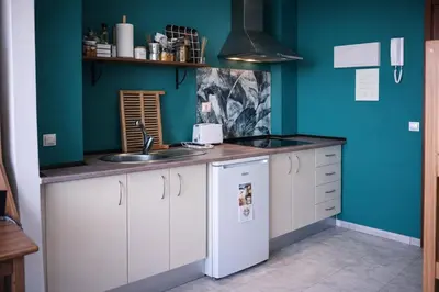 Una cocina o zona de cocina en SE - Peaceful Shiny Apartment Near Fibes