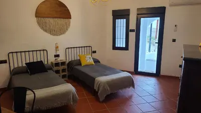 Cama o camas de una habitación en CASA CUEVA A-TIPICA