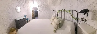Cama o camas de una habitación en CASA CUEVA A-TIPICA