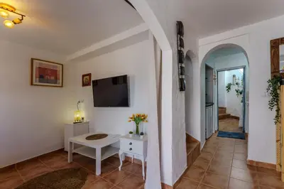 Una televisión o centro de entretenimiento en Casa del Patito with Vista by Duckling Stays
